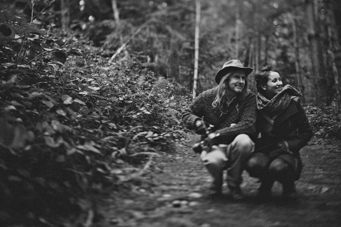 a couple laughing in the forest, helliwell park, hornby island, bc